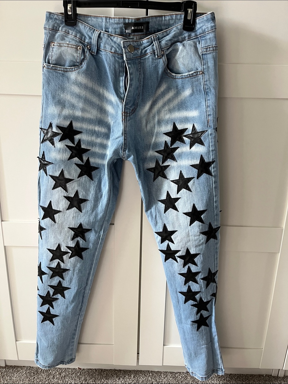 AMIRI Skinny Jeans with Black Stars